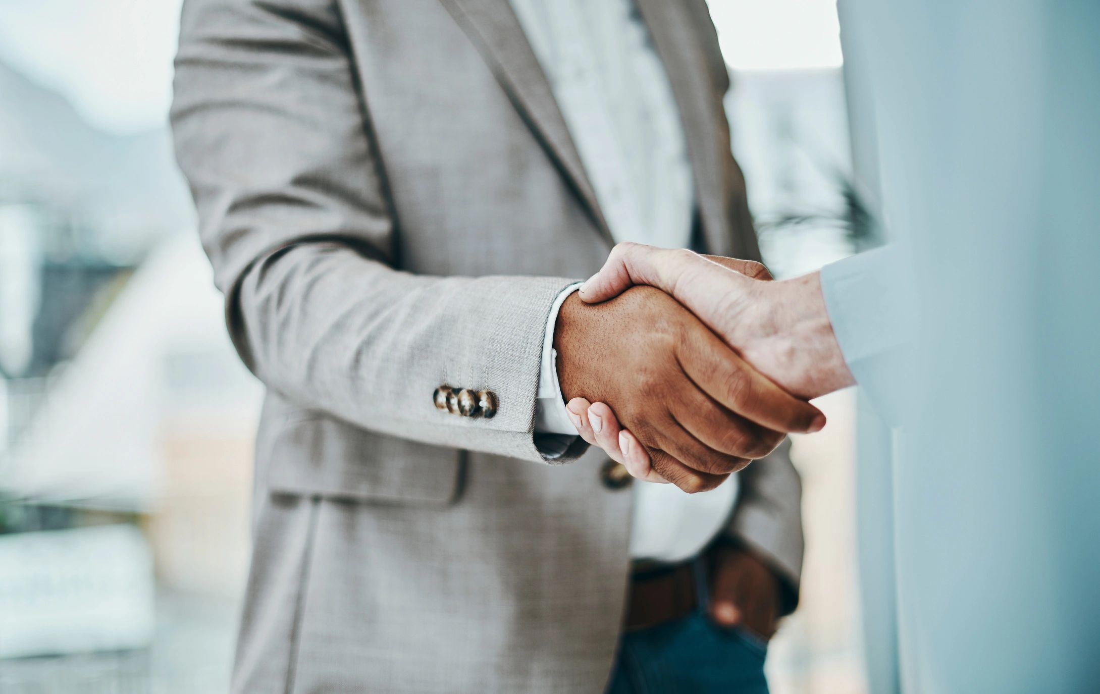 mergers acquisitions handshake